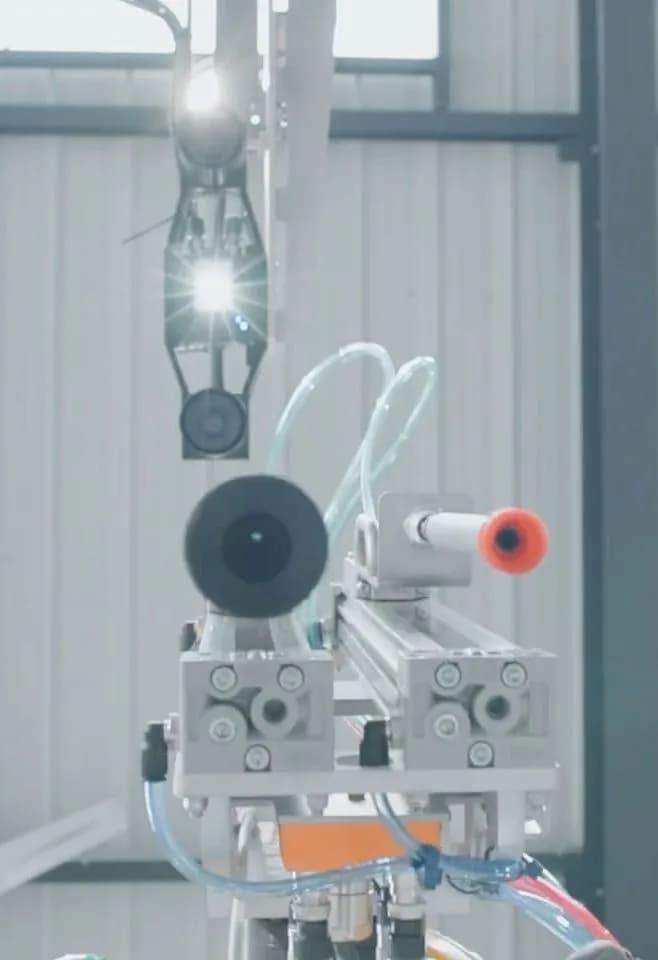 Caméra 3D avec préhension robot